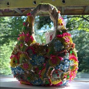 Vibrant Artistic Hobo Bag with Textured Floral Design